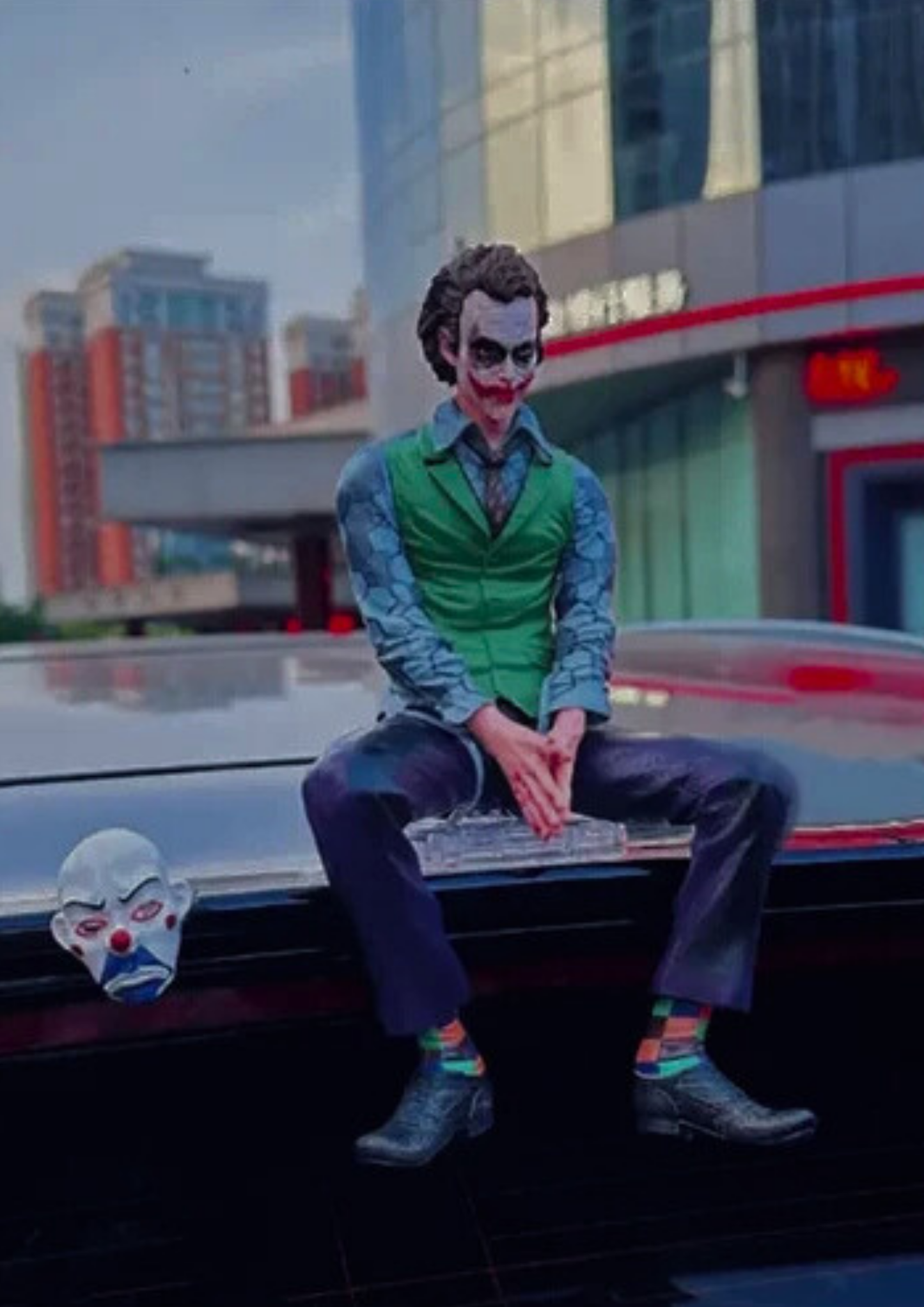 28cm Joker Action Figure – PVC Anime Collectible Figurine in Sitting Pose | Large Decorative Model Toy for Fans, Desk & Room Decor, Unique Gift for Collectors