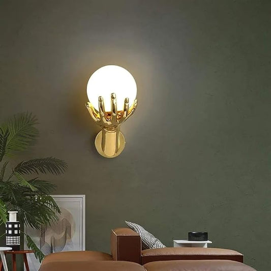 Golden Finish Resin Hand Holding Ball LED Wall Lamp